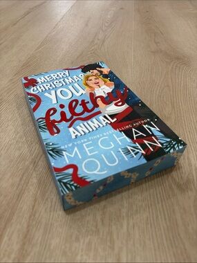Merry Christmas You Filthy Animal by Meghan Quinn - Festive Blue Paperback